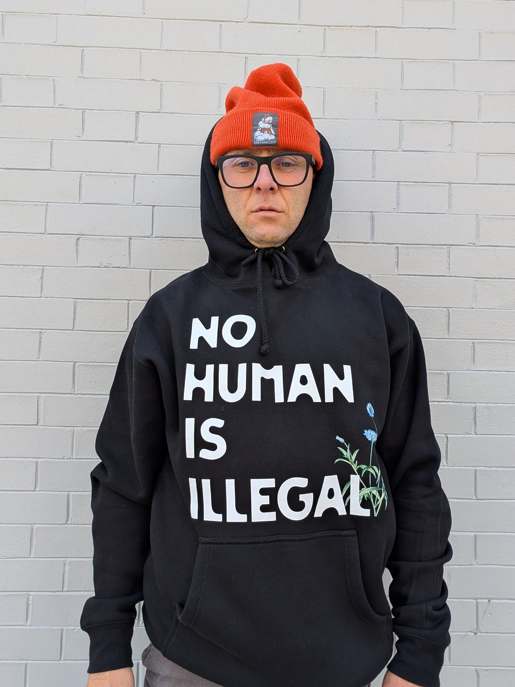 D. NO HUMAN IS ILLEGAL HOODIE
