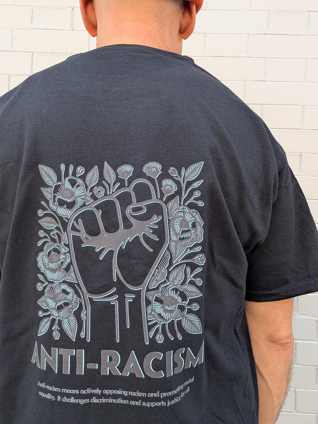 E. Anti racist tshirt